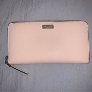 Light pink Kate Spade wristlet.